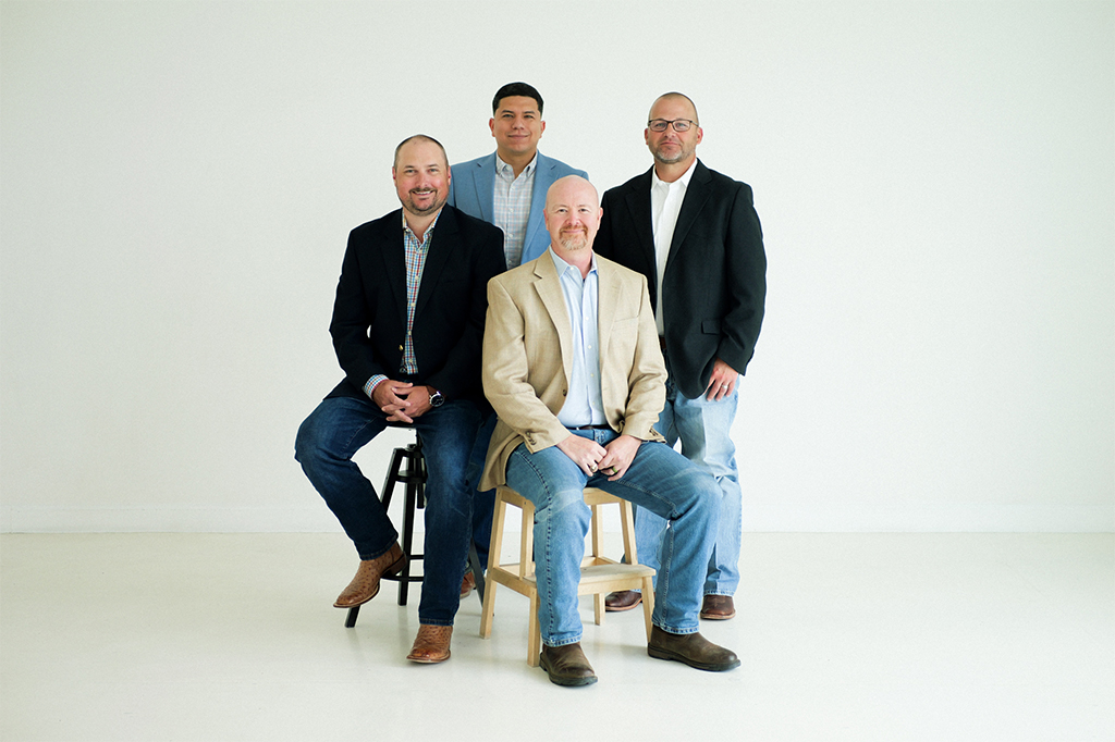 Group of 4 Engineers Planning Together